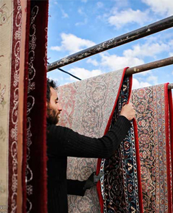 خشک کردن قالی در قالیشویی اختیاریه